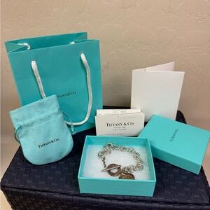 Tiffany & Co. Silver Bracelet with Charms.
Authentic!!!
